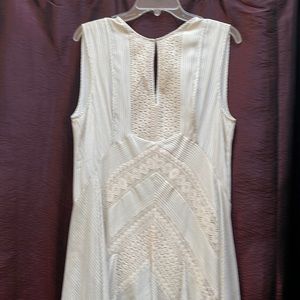 Max Azria dress. Size L. White with black lines and white lace. Unique dress